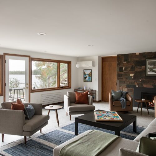 A warm, cozy space made for unwinding and enjoying movies or conversation.