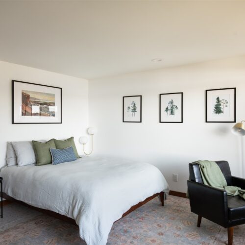 A bright guest room where the lake feels just steps away.