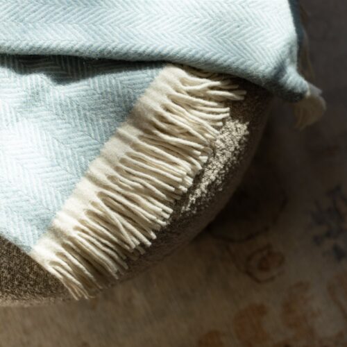 A blend of soft materials and gentle tones sets the scene for relaxation.