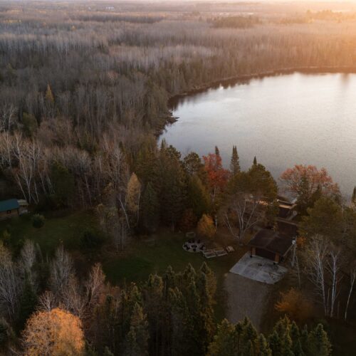 Morning light over a perfectly calm lake.